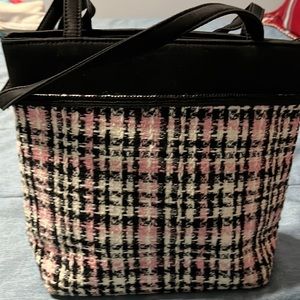 Pink and black houndstooth print purse